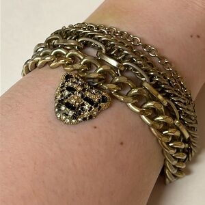 Gold Toned Multi-stranded Bracelet with Leopard Charm